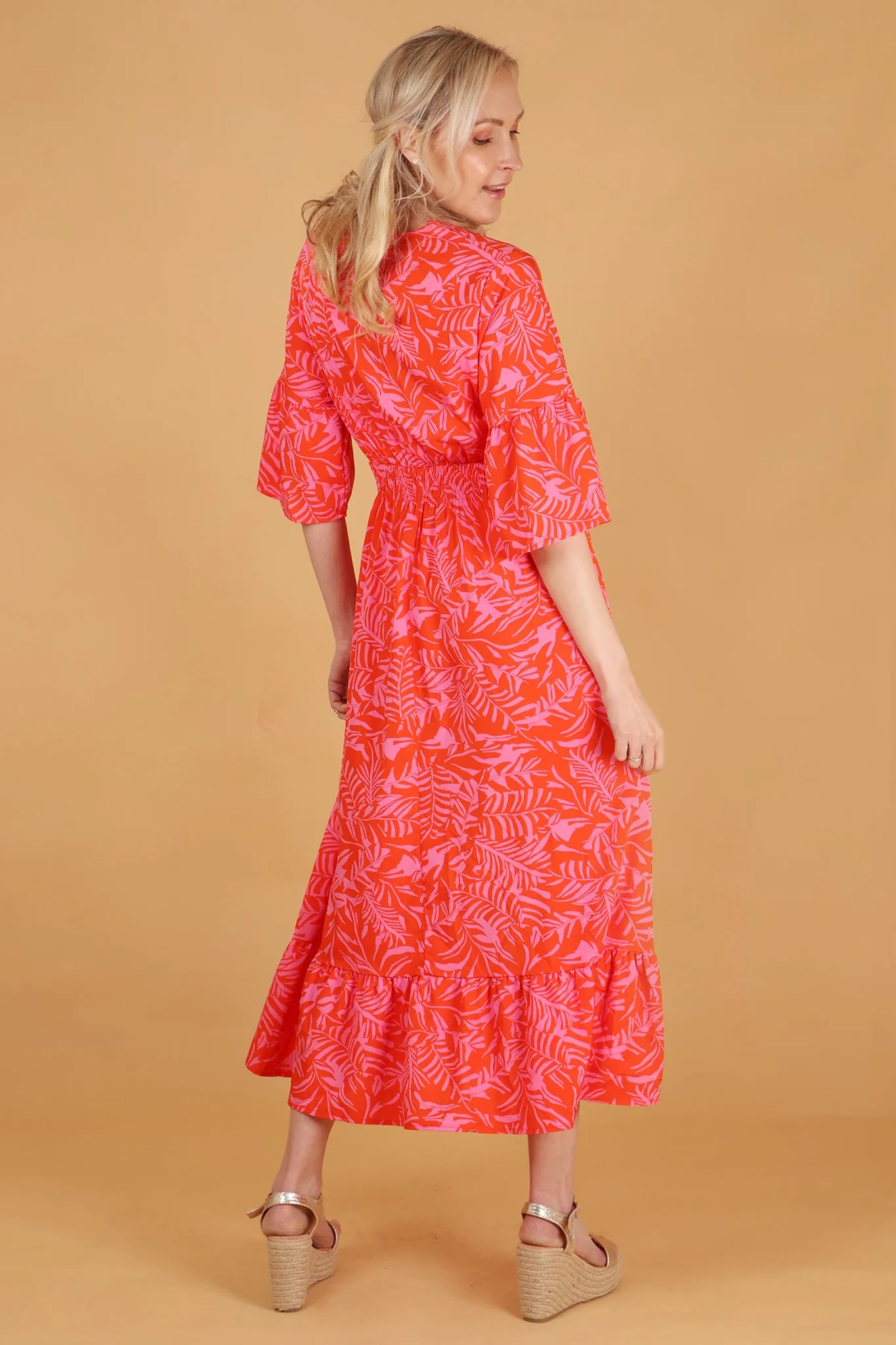 Tropical Leaf Print V-Neck Shirred Maxi Dress with Fluted Sleeves in Orange