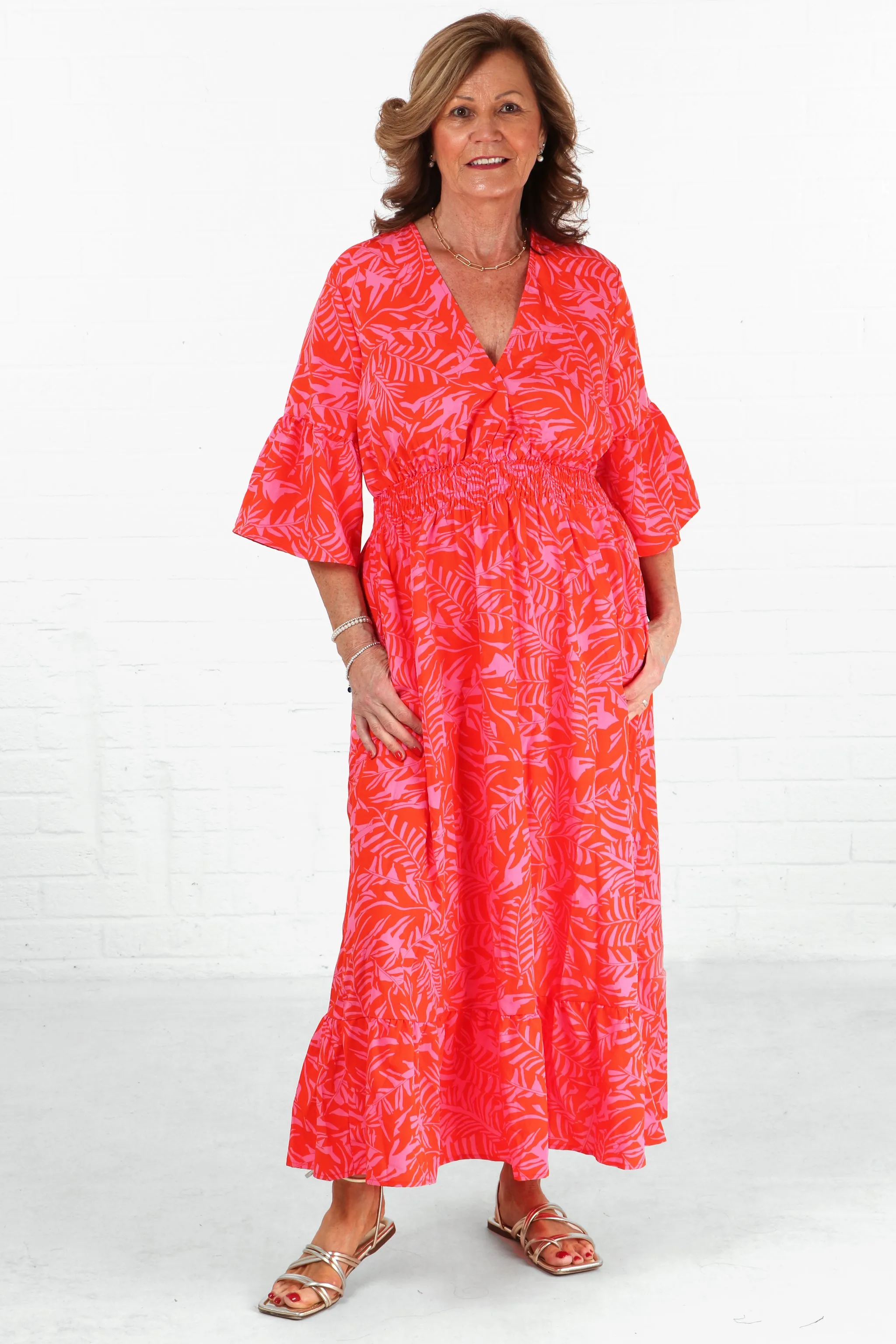 Tropical Leaf Print V-Neck Shirred Maxi Dress with Fluted Sleeves in Orange